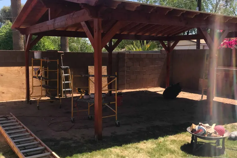 Timber ramada built over a backyard patio