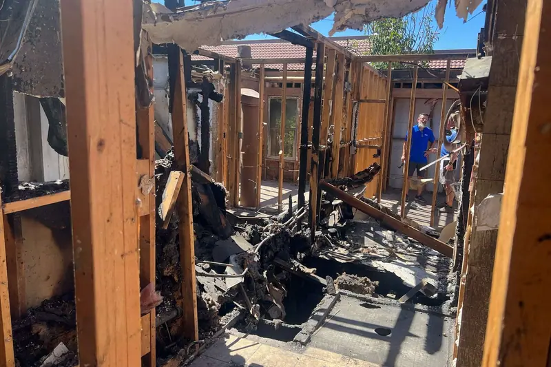 Fire damaged structure taken back to bare framing before rebuild